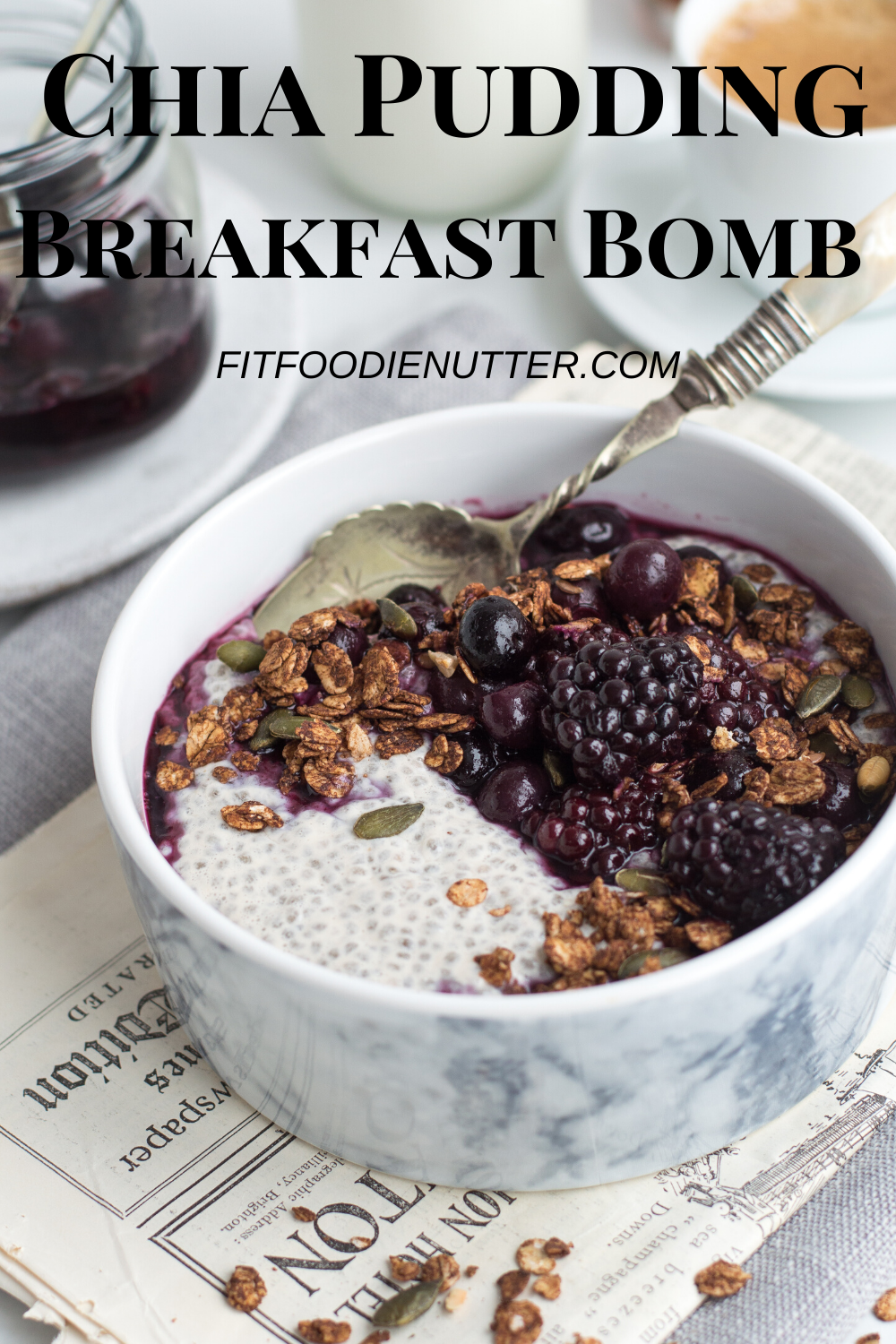 Chia pudding, berry compote & chocolate granola in a bowl