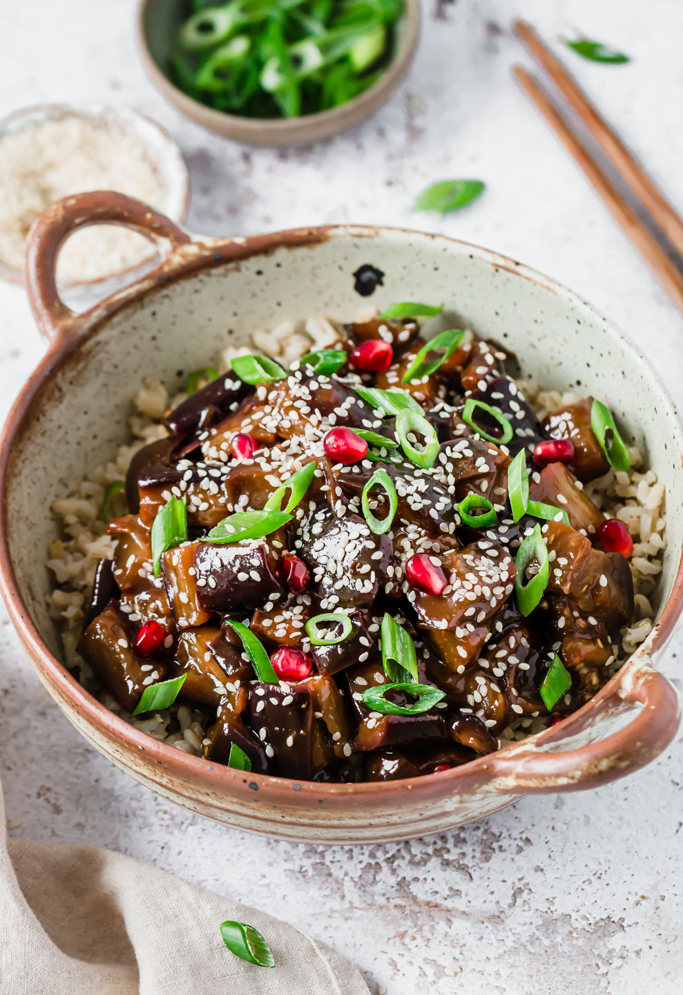 A bowl with vegan sticky aubergine & brown rice – Fit Foodie Nutter