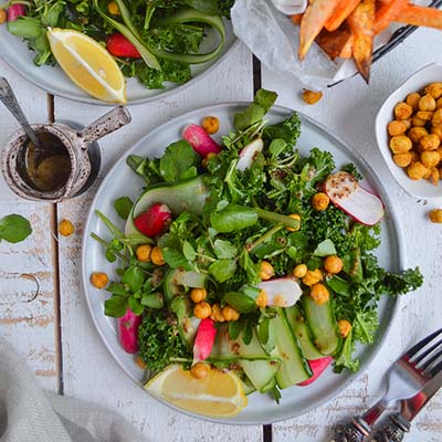 Vegan gluten free Green kale salad with spicy roasted chickpeas