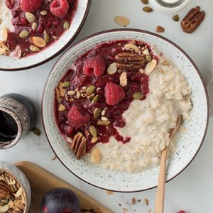 Overnight oats with plum & raspberry compote