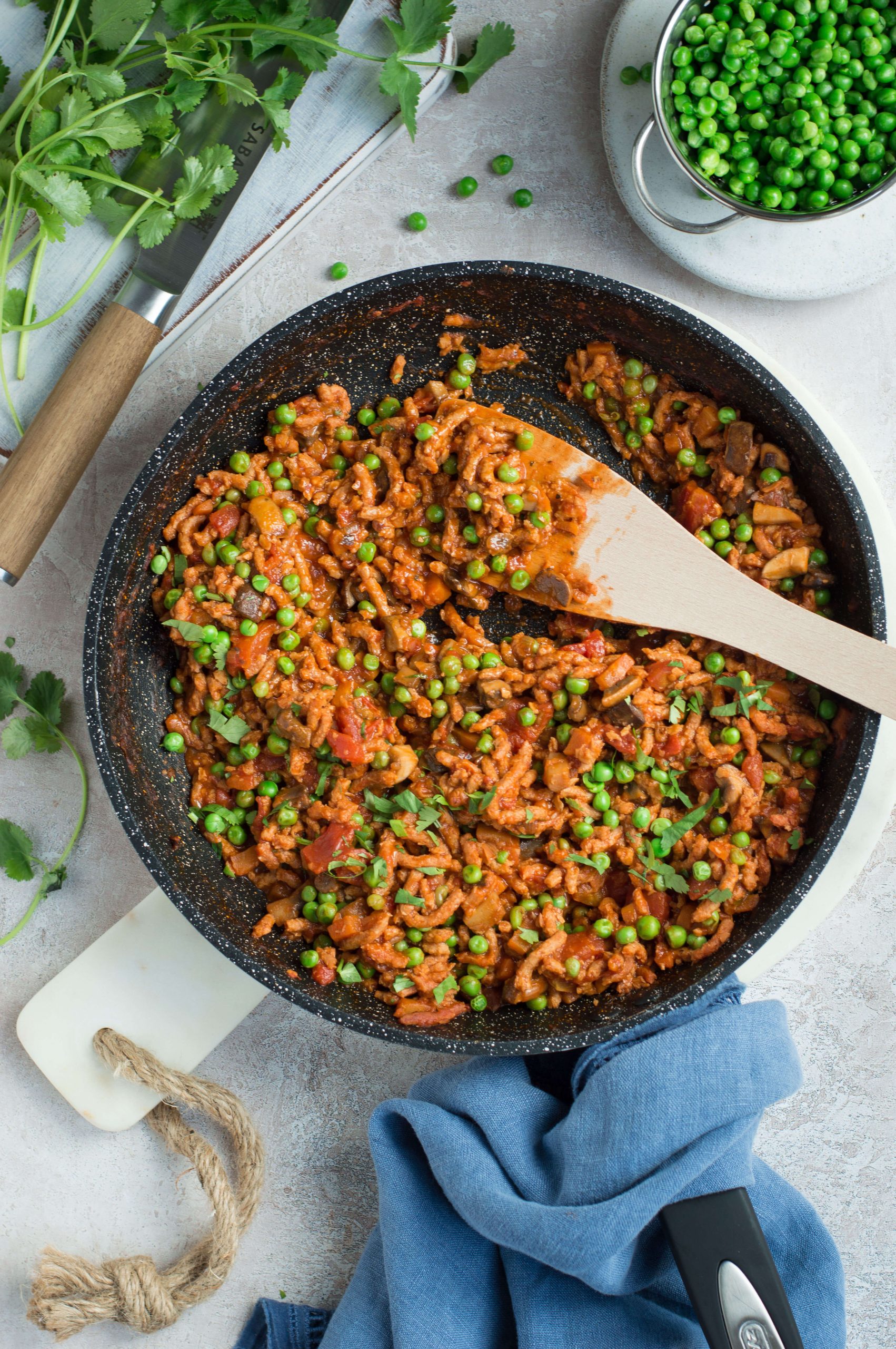 A frying pan with meat free mince meat & vegetables