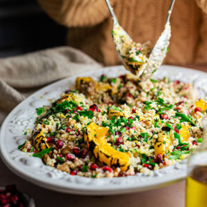 vegan winter tabbouleh salad on a white plate
